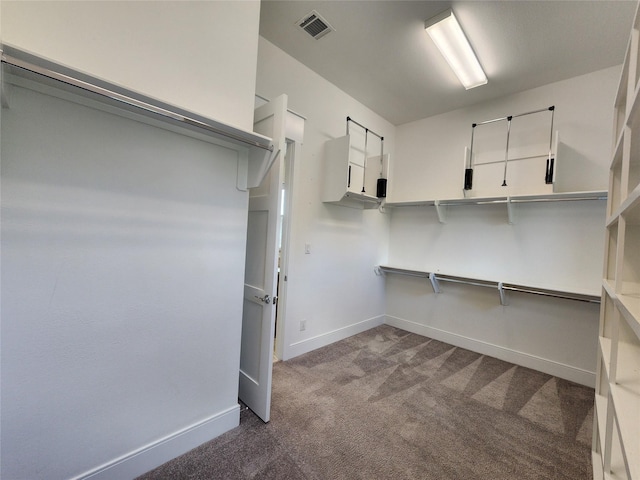3308 Cardinal Crest Ln, Houston, TX 77080 - spacious closet featuring dark carpet