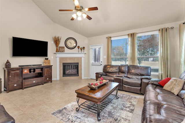 13607 Summer Hill Dr, Montgomery, TX 77356 - living room with lofted ceiling, a ceiling fan, light tile patterned floors, a tiled fireplace, and baseboards