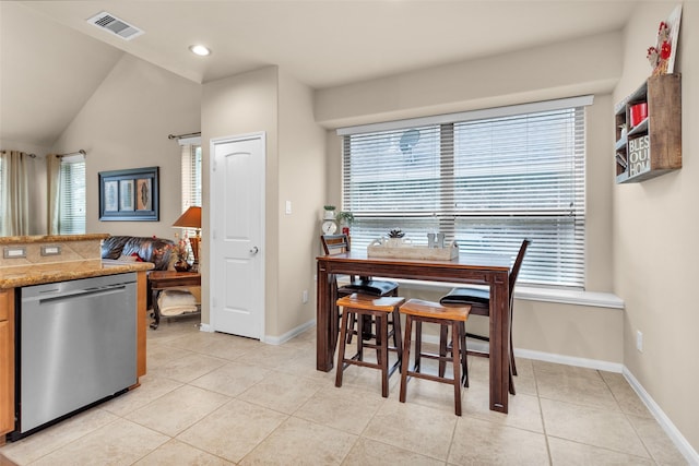 13607 Summer Hill Dr, Montgomery, TX 77356 - dining space with light tile patterned flooring, baseboards, recessed lighting, and vaulted ceiling