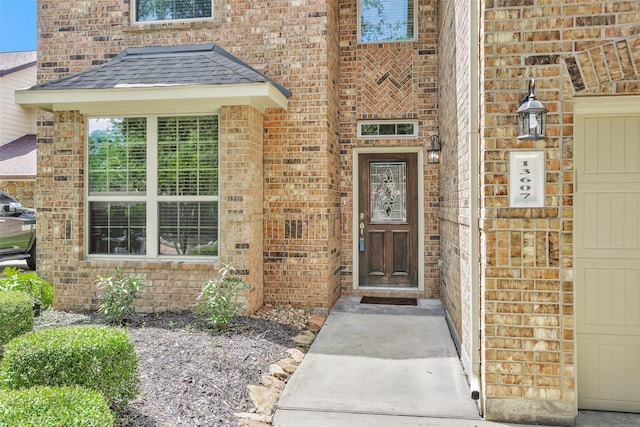 13607 Summer Hill Dr, Montgomery, TX 77356 - doorway to property with brick siding and roof with shingles