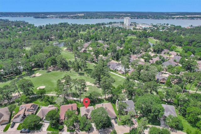 13607 Summer Hill Dr, Montgomery, TX 77356 - view of property location featuring a large body of water, nearby suburban area, a golf club, and a tree filled landscape