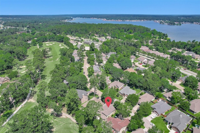 13607 Summer Hill Dr, Montgomery, TX 77356 - aerial view of property and surrounding area with a nearby body of water, nearby suburban area, and a golf course