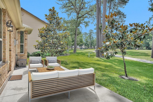 13607 Summer Hill Dr, Montgomery, TX 77356 - view of patio featuring an outdoor living space
