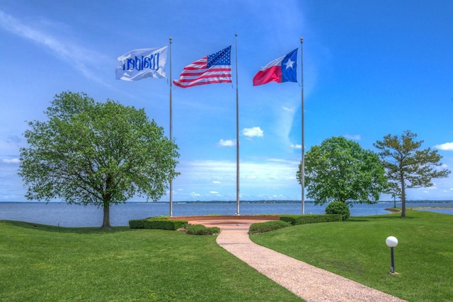 13607 Summer Hill Dr, Montgomery, TX 77356 - view of community featuring a lawn and a water view