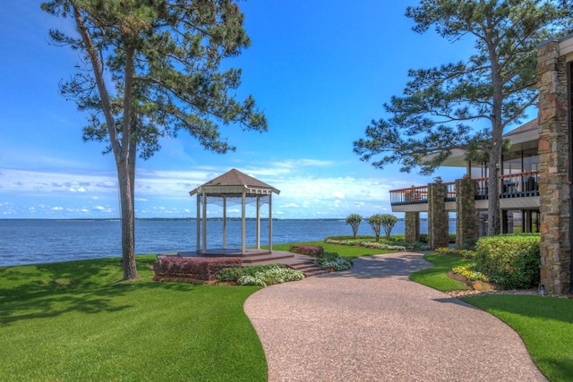 13607 Summer Hill Dr, Montgomery, TX 77356 - surrounding community with a gazebo, a lawn, and a water view