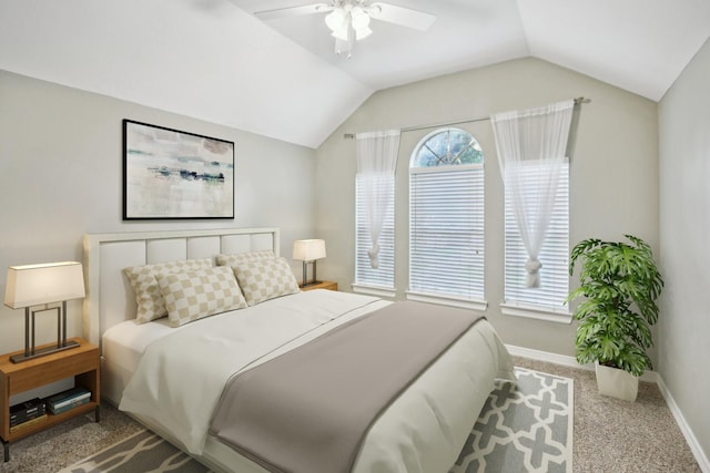 4011 N Water Iris Ct, Houston, TX 77059 - carpeted bedroom featuring vaulted ceiling, baseboards, and a ceiling fan