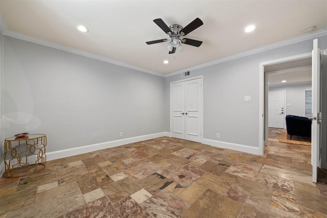 3402 Garrott St Unit 13, Houston, TX 77006 - unfurnished bedroom with stone tile flooring, baseboards, recessed lighting, crown molding, and a closet