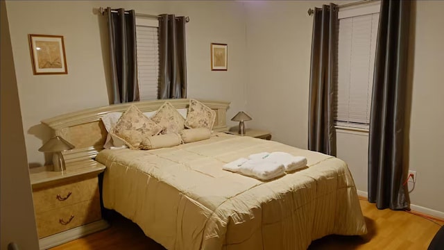 16631 Henry Morgan Rd, Jamaica Beach, TX 77554 - bedroom with wood finished floors and baseboards