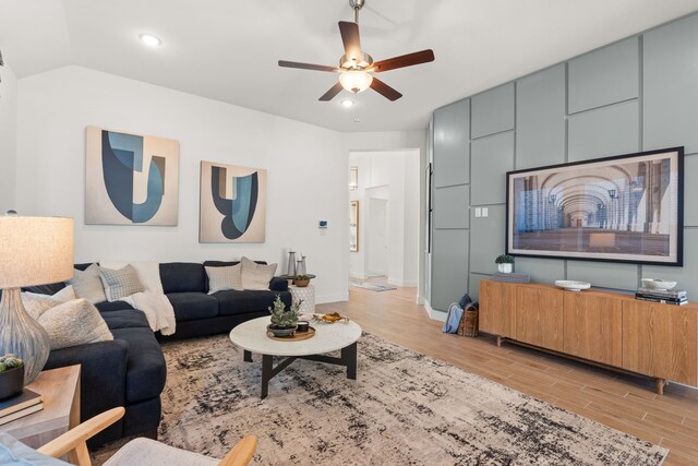 12027 Crooked Creek Ln, Santa Fe, TX 77510 - living room with light wood finished floors, ceiling fan, and baseboards