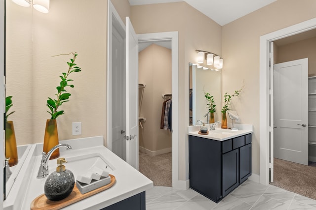12027 Crooked Creek Ln, Santa Fe, TX 77510 - full bathroom featuring vanity, marble finish floors, and baseboards