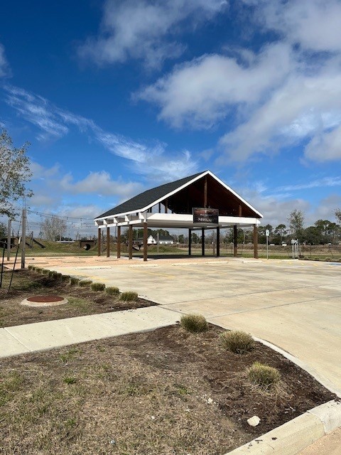 12027 Crooked Creek Ln, Santa Fe, TX 77510 - view of community with concrete driveway