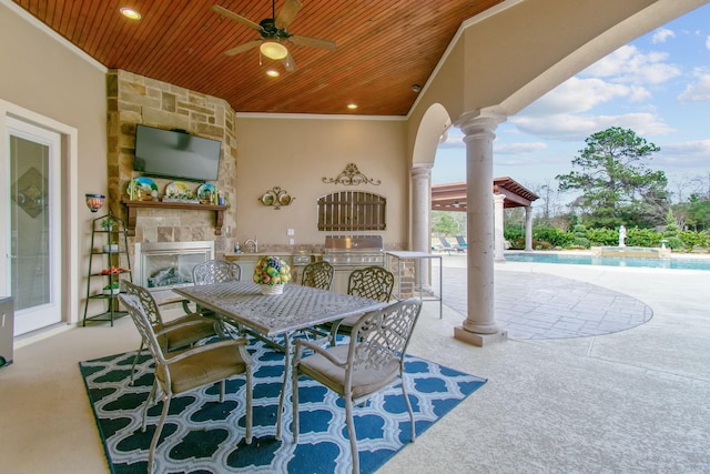 9436 Hufsmith Rd, Tomball, TX 77375 - view of patio / terrace featuring a ceiling fan, an outdoor pool, a sink, and outdoor dining space