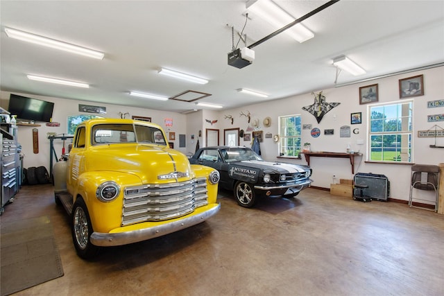 9436 Hufsmith Rd, Tomball, TX 77375 - garage with a garage door opener