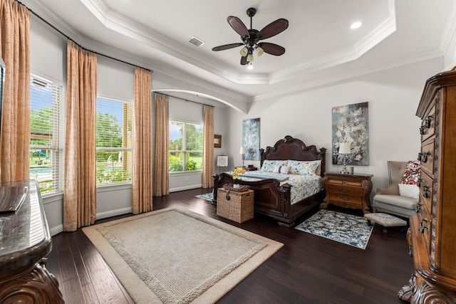 9436 Hufsmith Rd, Tomball, TX 77375 - bedroom with a raised ceiling, ornamental molding, dark wood finished floors, a ceiling fan, and recessed lighting