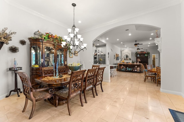 9436 Hufsmith Rd, Tomball, TX 77375 - dining space with arched walkways, a ceiling fan, recessed lighting, crown molding, and a chandelier