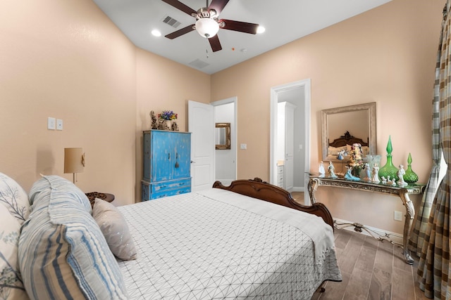 9436 Hufsmith Rd, Tomball, TX 77375 - bedroom with wood finished floors, baseboards, a ceiling fan, and recessed lighting