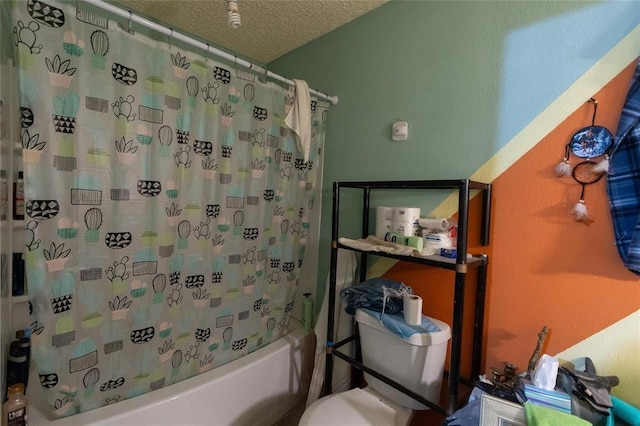 1927 Dormstom Ln, Houston, TX 77088 - full bathroom featuring a textured ceiling, shower / bath combo, and toilet
