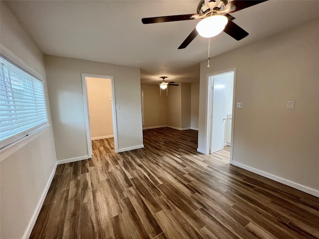 1705 Westwind Dr, Brenham, TX 77833 - empty room with ceiling fan, wood finished floors, and baseboards