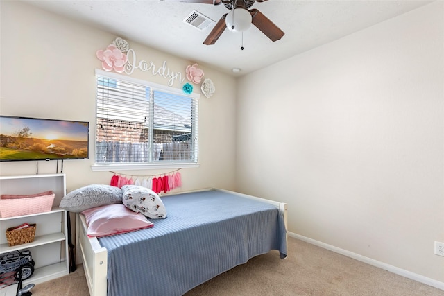 13602 Kodiak Brown Bear St, Crosby, TX 77532 - bedroom with carpet, baseboards, and ceiling fan