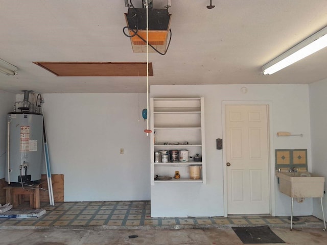 209 Montclaire Dr, West Columbia, TX 77486 - garage with water heater and a garage door opener