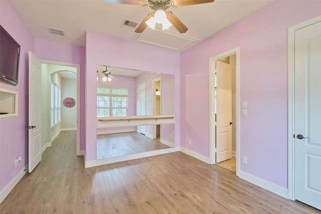 13606 Oak Harbor Bnd, Cypress, TX 77429 - hallway with attic access, wood finished floors, and baseboards