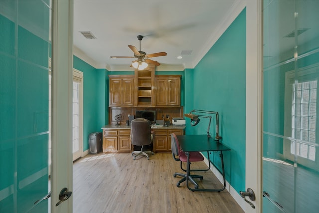 13606 Oak Harbor Bnd, Cypress, TX 77429 - office with ornamental molding, built in study area, plenty of natural light, baseboards, and a ceiling fan
