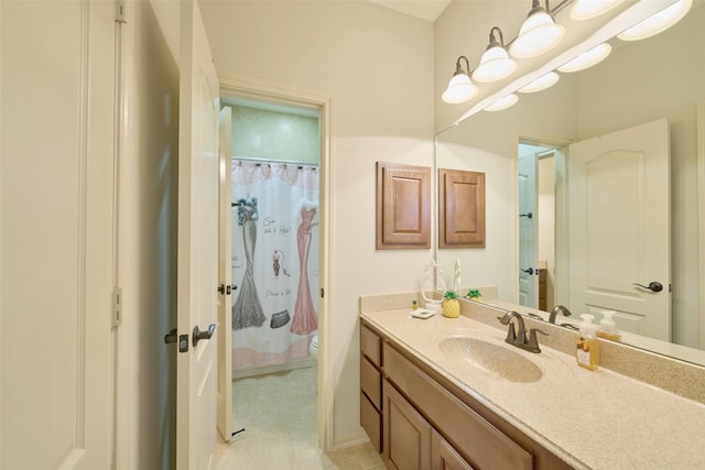 13606 Oak Harbor Bnd, Cypress, TX 77429 - full bath featuring vanity, toilet, baseboards, and curtained shower