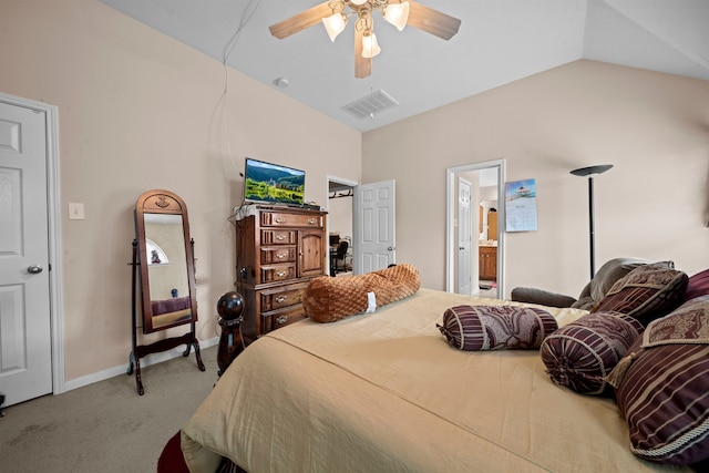 carpeted bedroom with a ceiling fan, baseboards, ensuite bathroom, and vaulted ceiling