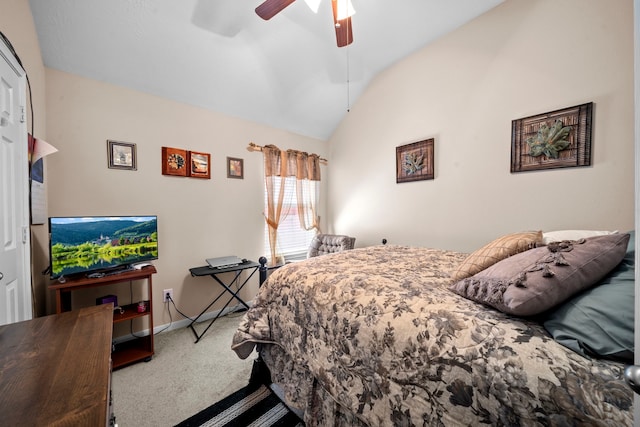 carpeted bedroom with vaulted ceiling, ceiling fan, and baseboards