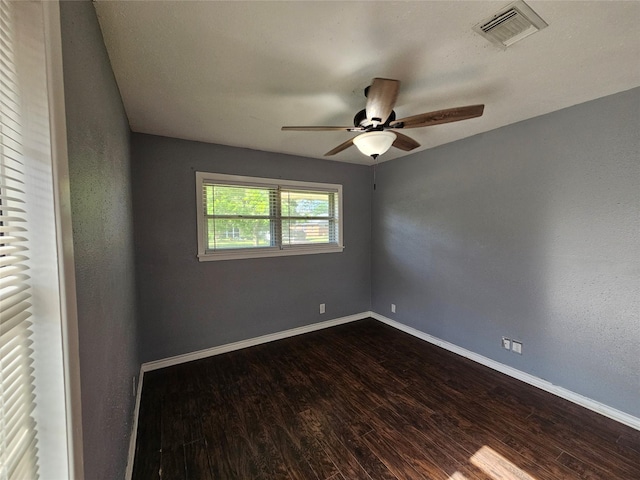 111 Carnation St, Lake Jackson, TX 77566 - unfurnished room with a ceiling fan, dark wood-type flooring, and baseboards