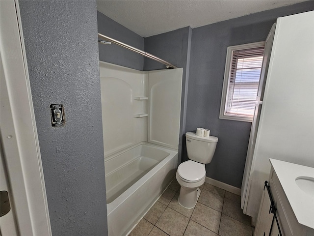 111 Carnation St, Lake Jackson, TX 77566 - full bathroom with toilet, tile patterned flooring, vanity, tub / shower combination, and a textured ceiling