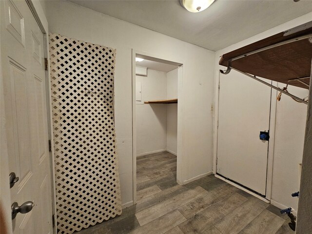 111 Carnation St, Lake Jackson, TX 77566 - basement with dark wood finished floors and baseboards