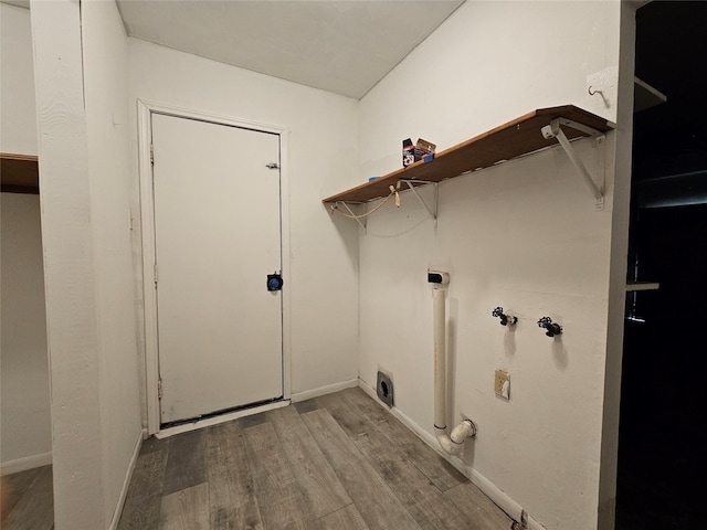 111 Carnation St, Lake Jackson, TX 77566 - washroom featuring wood finished floors, baseboards, and electric dryer hookup