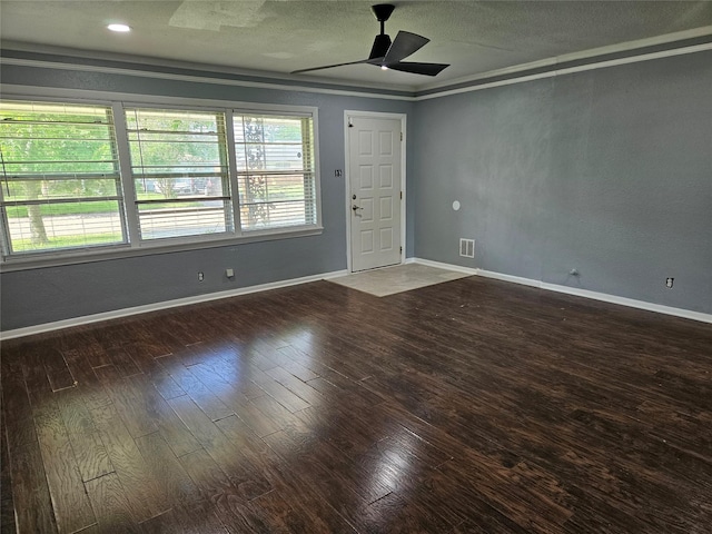 111 Carnation St, Lake Jackson, TX 77566 - empty room featuring ceiling fan, wood finished floors, a textured ceiling, and baseboards