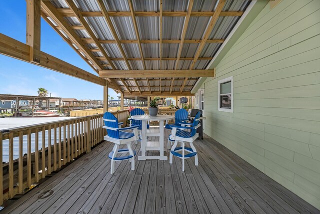 518 Marine Way, Freeport, TX 77541 - wooden deck featuring outdoor dining area