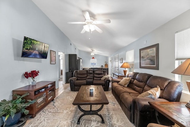 518 Marine Way, Freeport, TX 77541 - living area with lofted ceiling, ceiling fan, and light wood-style flooring