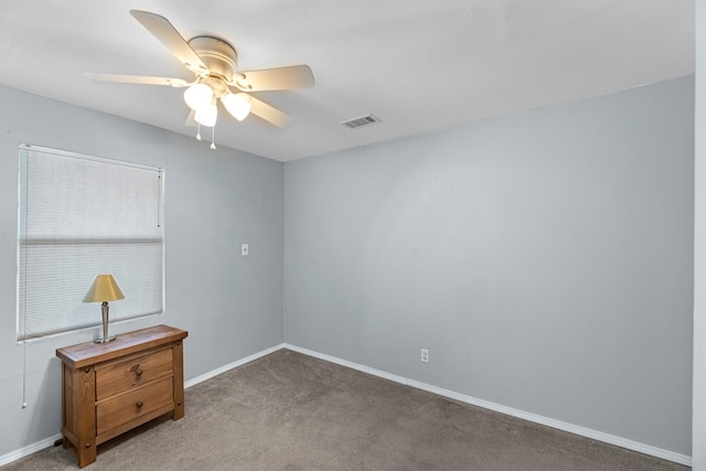 518 Marine Way, Freeport, TX 77541 - empty room with ceiling fan, baseboards, and light colored carpet