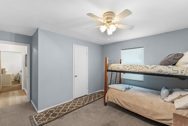 518 Marine Way, Freeport, TX 77541 - carpeted bedroom featuring baseboards and ceiling fan
