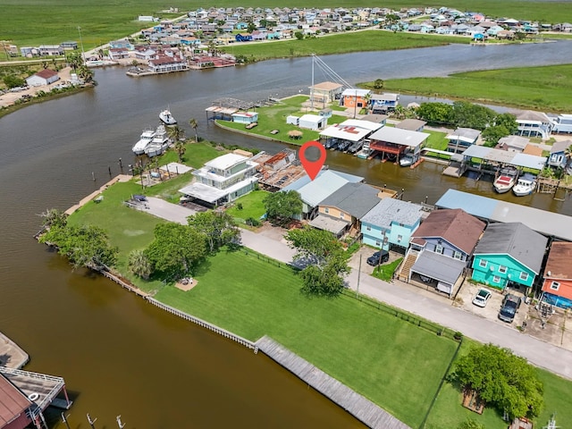 518 Marine Way, Freeport, TX 77541 - aerial view of residential area with a large body of water