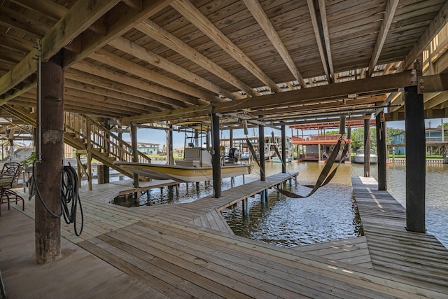 518 Marine Way, Freeport, TX 77541 - dock featuring boat lift and a water view