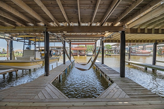 518 Marine Way, Freeport, TX 77541 - dock area featuring boat lift and a water view