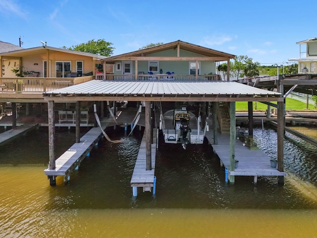518 Marine Way, Freeport, TX 77541 - dock area with boat lift and a water view