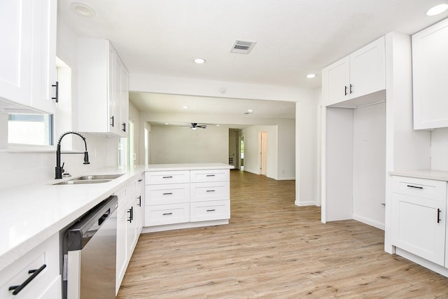 1915 Springrock Ln, Houston, TX 77080 - kitchen with dishwasher, a sink, a ceiling fan, recessed lighting, and a peninsula