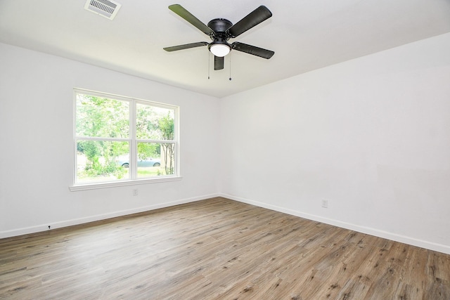 1915 Springrock Ln, Houston, TX 77080 - unfurnished room featuring wood finished floors, baseboards, and ceiling fan