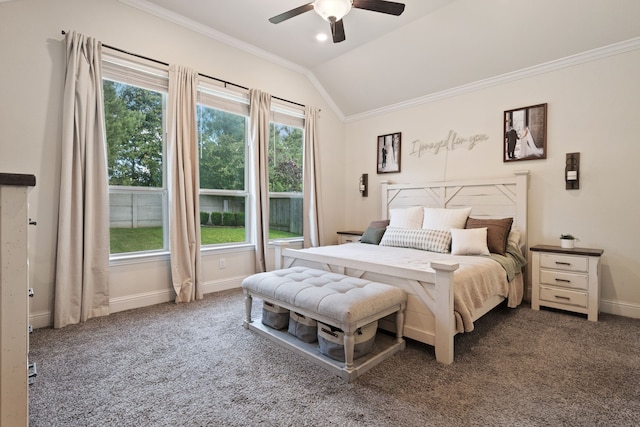 carpeted bedroom with ornamental molding, lofted ceiling, baseboards, and ceiling fan
