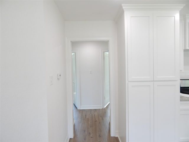 846 Magnolia St, Lake Jackson, TX 77566 - corridor with wood finished floors and baseboards