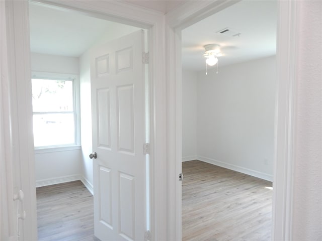 846 Magnolia St, Lake Jackson, TX 77566 - corridor featuring light wood-style floors and baseboards
