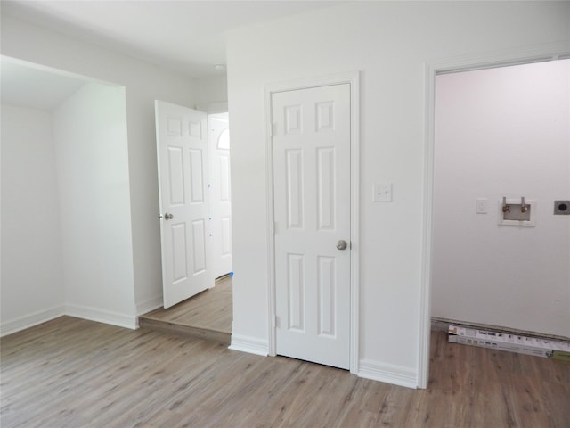846 Magnolia St, Lake Jackson, TX 77566 - unfurnished bedroom with light wood-style flooring and baseboards