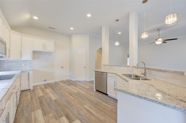 12507 Antean Way Ct, Houston, TX 77065 - kitchen featuring dishwasher, a sink, decorative backsplash, white cabinetry, and recessed lighting