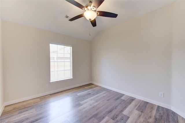 12507 Antean Way Ct, Houston, TX 77065 - unfurnished room with light wood-style floors, a ceiling fan, baseboards, and lofted ceiling